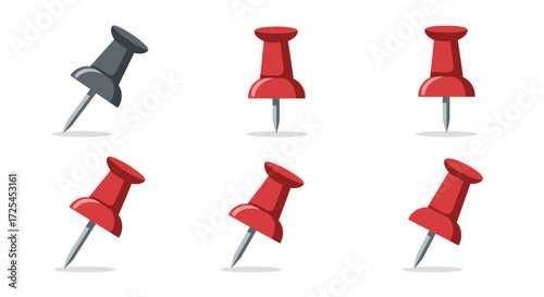 A collection of colorful push pins and thumbtacks isolated on white