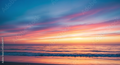 Beautiful and colorful sunset at the beach with a calm sea, generative ai.