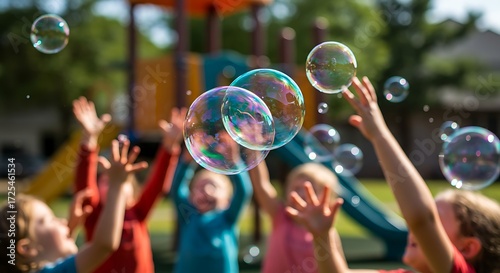 Joyful kids playing with iridescent soap bubbles outdoors at a sunny playground, capturing happy childhood fun and innocence.