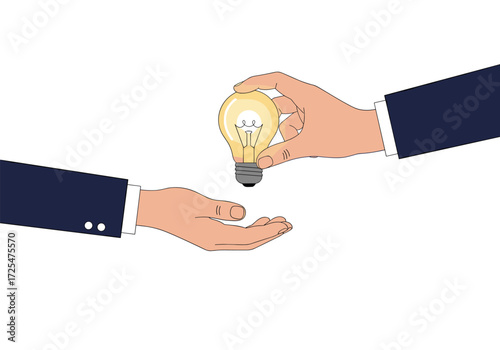 A hand passing a glowing light bulb to another hand.