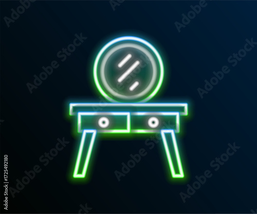 Glowing neon line Dressing table icon isolated on black background. Colorful outline concept. Vector