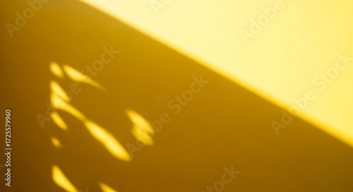 Illustration of abstract yellow background with diagonal light and shadow patterns, creating a warm and inviting atmosphere