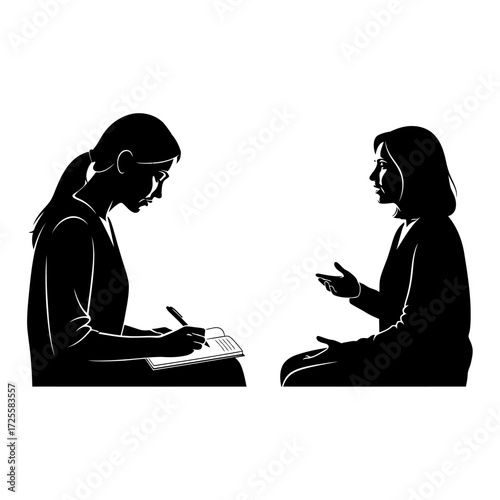 Professional psychologist listens intently to patient's story while taking notes in a supportive therapy session