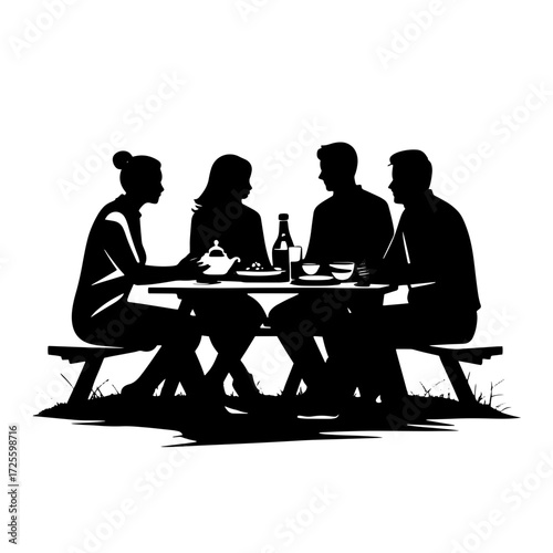 Group of friends sharing a meal outdoors in a relaxed setting during a warm afternoon with a picnic theme