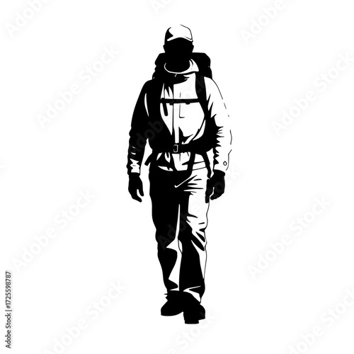 Hiker preparing for an adventure in the mountains during the early morning hours