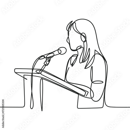 Woman speaking at a podium with a microphone