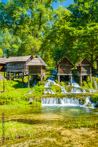 Old wooden mills Mlincici near Jajce on Plivsko Lake, Bosnia and Herzegovina, popular tourist attraction