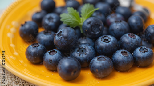 Wallpaper Mural Juicy blueberries on a bright plate make for a tasty and healthy treat, ideal for those who love snacking smartly. Torontodigital.ca