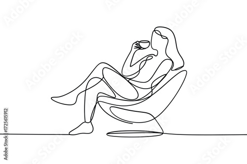 Woman enjoying a cup of coffee in a modern chair