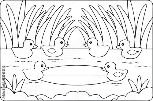 Five cute ducklings swim peacefully in a pond surrounded by tall grass