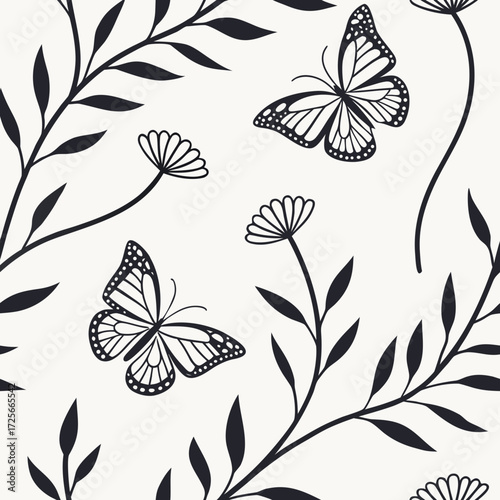 Elegant Butterfly and floral Pattern: An enchanting illustration of delicate butterflies gracefully dance amidst an exquisite floral pattern. This design blends the grace of nature.