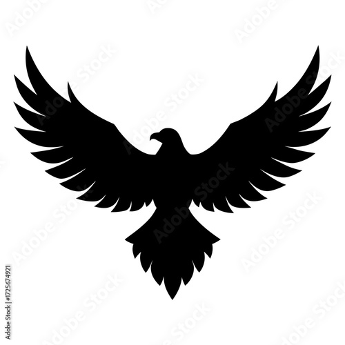 Black silhouette of a bird of prey with wings spread wide