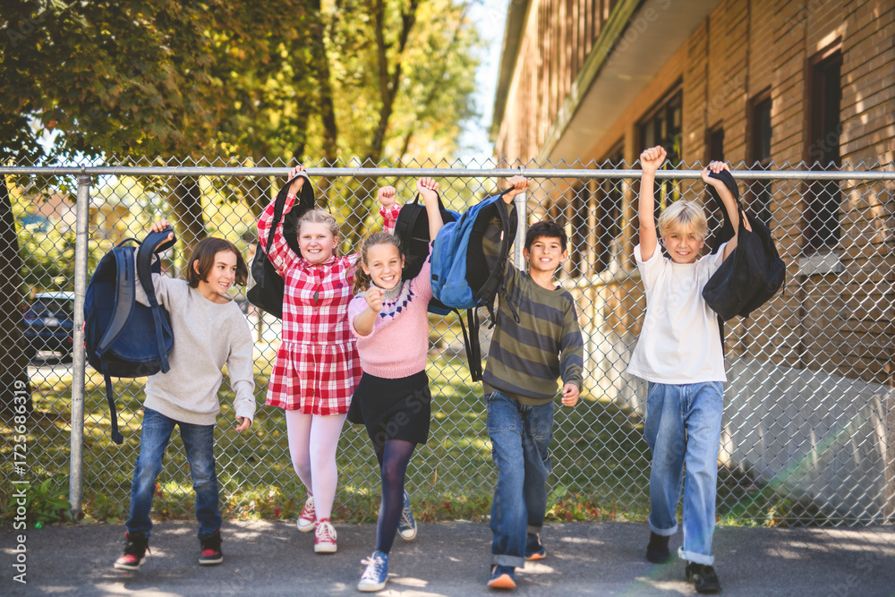 Fototapeta premium Group Of Young Children Hanging Out In Playground