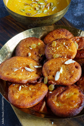 Taler Malpua | Traditional Bengali Sweet Pancakes Made with Palm Fruit and Jaggery, Fried and Soaked in Sugar Syrup | Authentic Bengali Dessert for Festivals and Special Occasions
