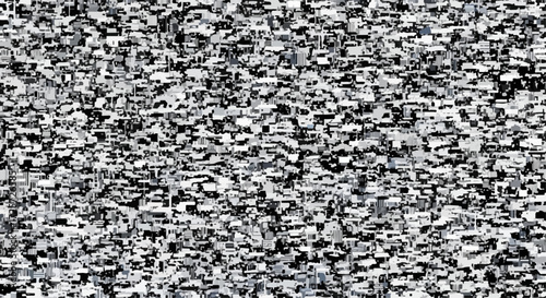 Gray noise background displaying white and black static on television screen. Noise background shows static pattern and distorted signal, illustrating technical issues.