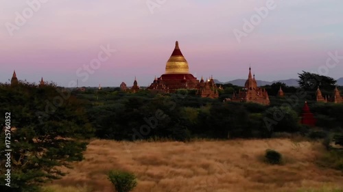 Golden light bathes the ancient temples of bagan at dusk, myanmar