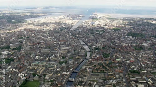 Aerial view of dublin city showing the river liffey flowing to the sea