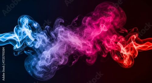 Wallpaper Mural Abstract colorful smoke swirling in a dark background, creating a dynamic and energetic visual effect with vibrant blue and red hues Torontodigital.ca