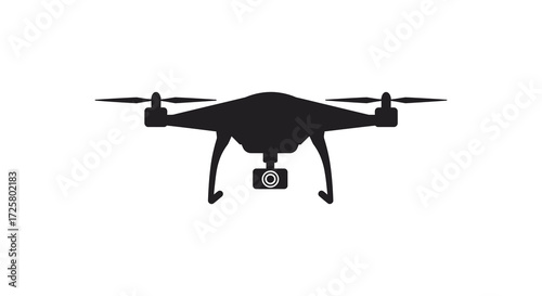A black drone with four rotors captured in a stark silhouette