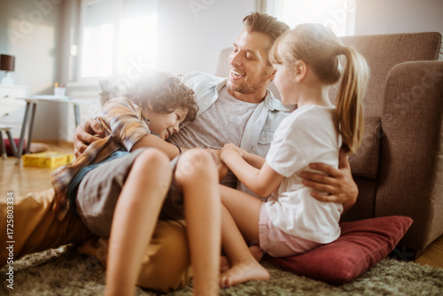 Tableau sur toile Family playing together at home