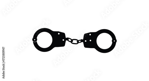 Black metal handcuffs displayed on a white background a stark silhouette