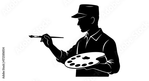 Creative artist painting with brush and palette