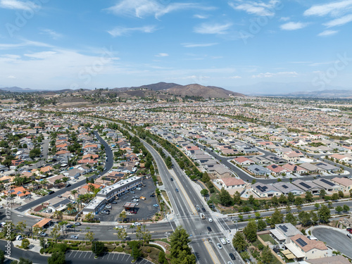 Aerial view of a sprawling neighborhood of family homes in Menifee city in Riverside County, California, United States