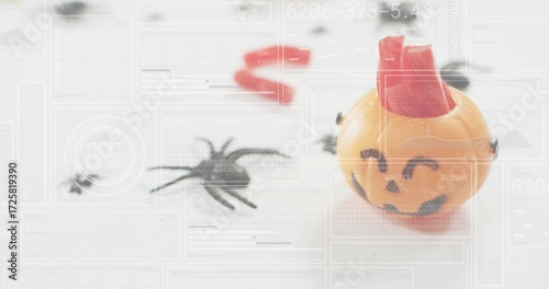 Camera panning starting jack-o'-lantern moving closer as overlays updating, spider confetti still