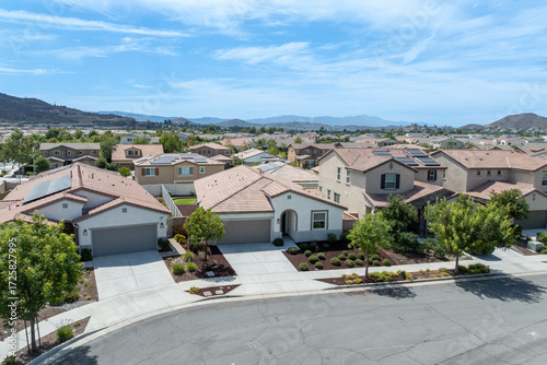 Aerial view of a sprawling neighborhood of family homes in Menifee city in Riverside County, California, United States