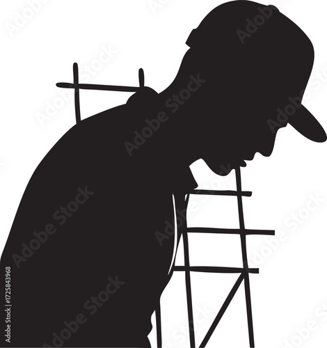 Silhouette of a thoughtful man wearing cap near a ladder construction