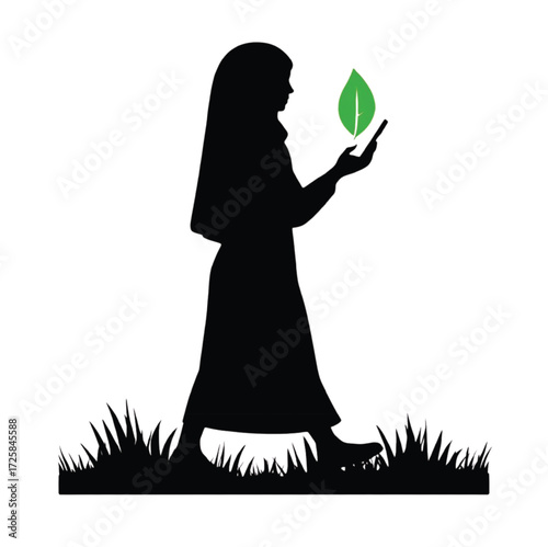 Silhouette woman in hijab holding smartphone with green leaf icon