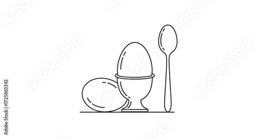 A soft boiled egg in an egg cup with a spoon and another egg beside it.