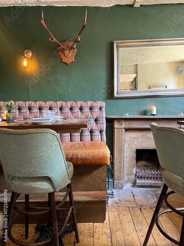 Cozy Pub Interior with Fireplace and Antlers