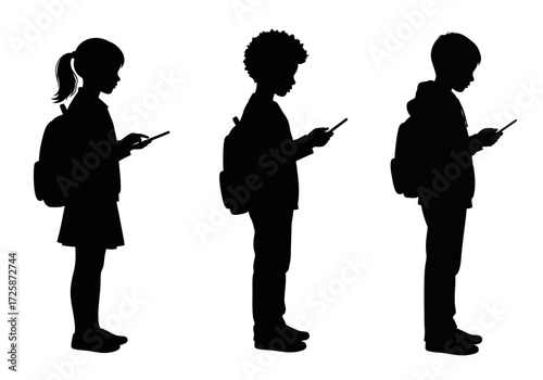 Silhouettes of diverse young students with backpacks, focused on digital tablets for modern education and mobile learning technology