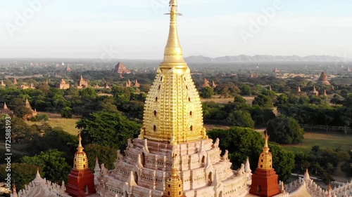 Golden pagoda rises above the ancient city of bagan in myanmar
