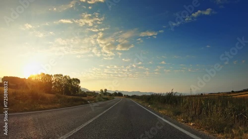 Sunset scenery, evening in the golden valley, POV driver perspective