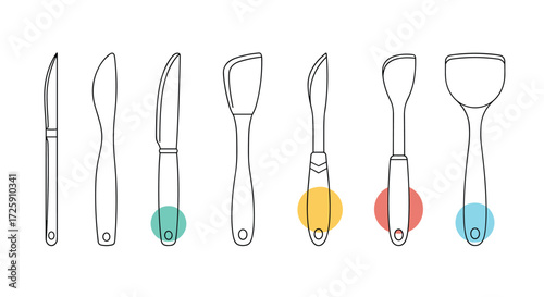 An assortment of kitchen utensils including knives and spatulas are displayed in a row.
