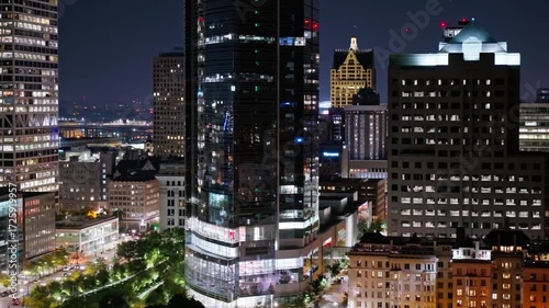 Wallpaper Mural Milwaukee skyline glows at night with illuminated buildings and city lights Torontodigital.ca