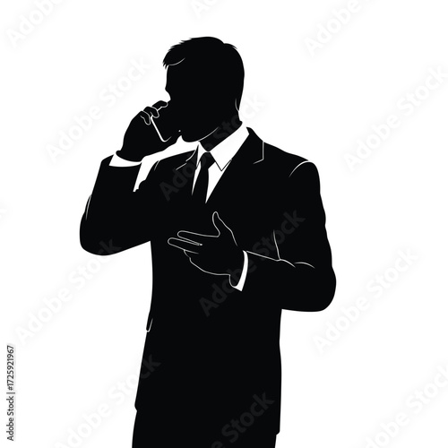 Sharp dressed man talking on phone a striking dark silhouette