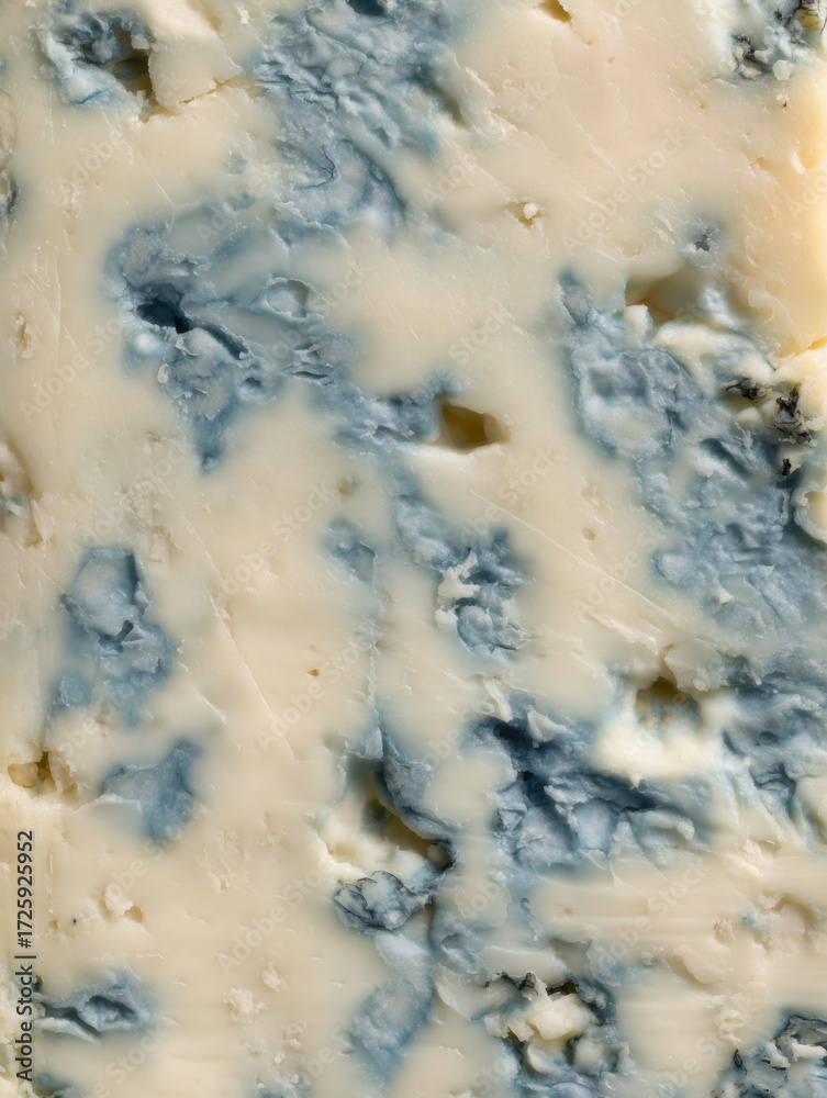 Obraz premium Delicious blue cheese with creamy texture and distinctive blue veins found in gourmet cheese shop