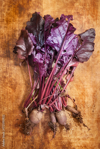 Fresh picked beets on a wood background 