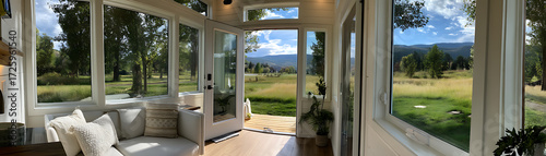 Panorama of the clean white doors and windows of a small house
