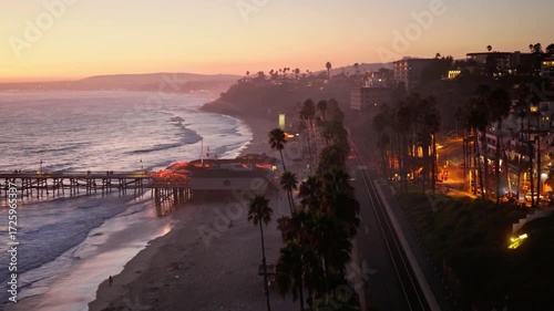 Wallpaper Mural Sunset illuminates the pier and coastline of laguna beach, california Torontodigital.ca