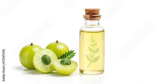 Amla oil in a bottle with fresh amla fruit isolated on white background