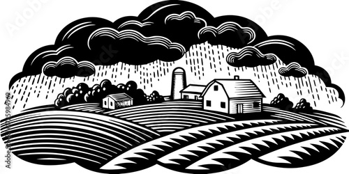 Rain clouds over farm landscape with agricultural fields and buildings  