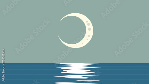 Crescent moon over the ocean with reflection