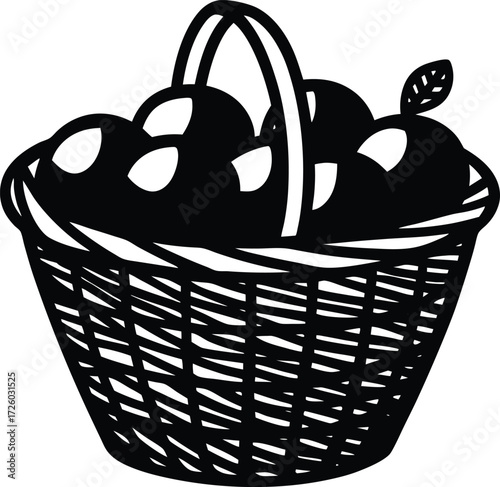 A rustic woven basket overflowing with dark round fruits possibly apples or plums