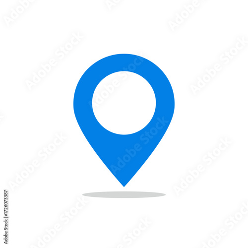 Free Download A blue map pin icon with a white center circle and a subtle gray shadow beneath placed on a white background - GFXLoad