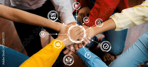 Fotografía Startup company employee team stacking hand together symbolize successful group of business partnership and strong collective unity teamwork in community workplace in panoramic banner