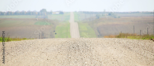 dirt road and hills in background